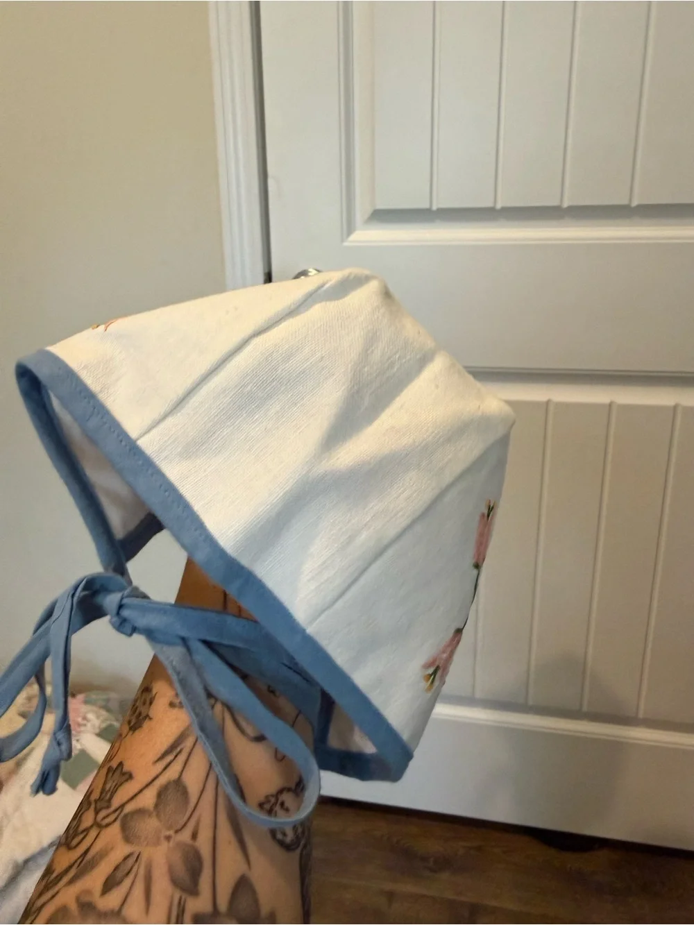 Embroidered Floral Kids Bonnet in Cream with Blue Trim
